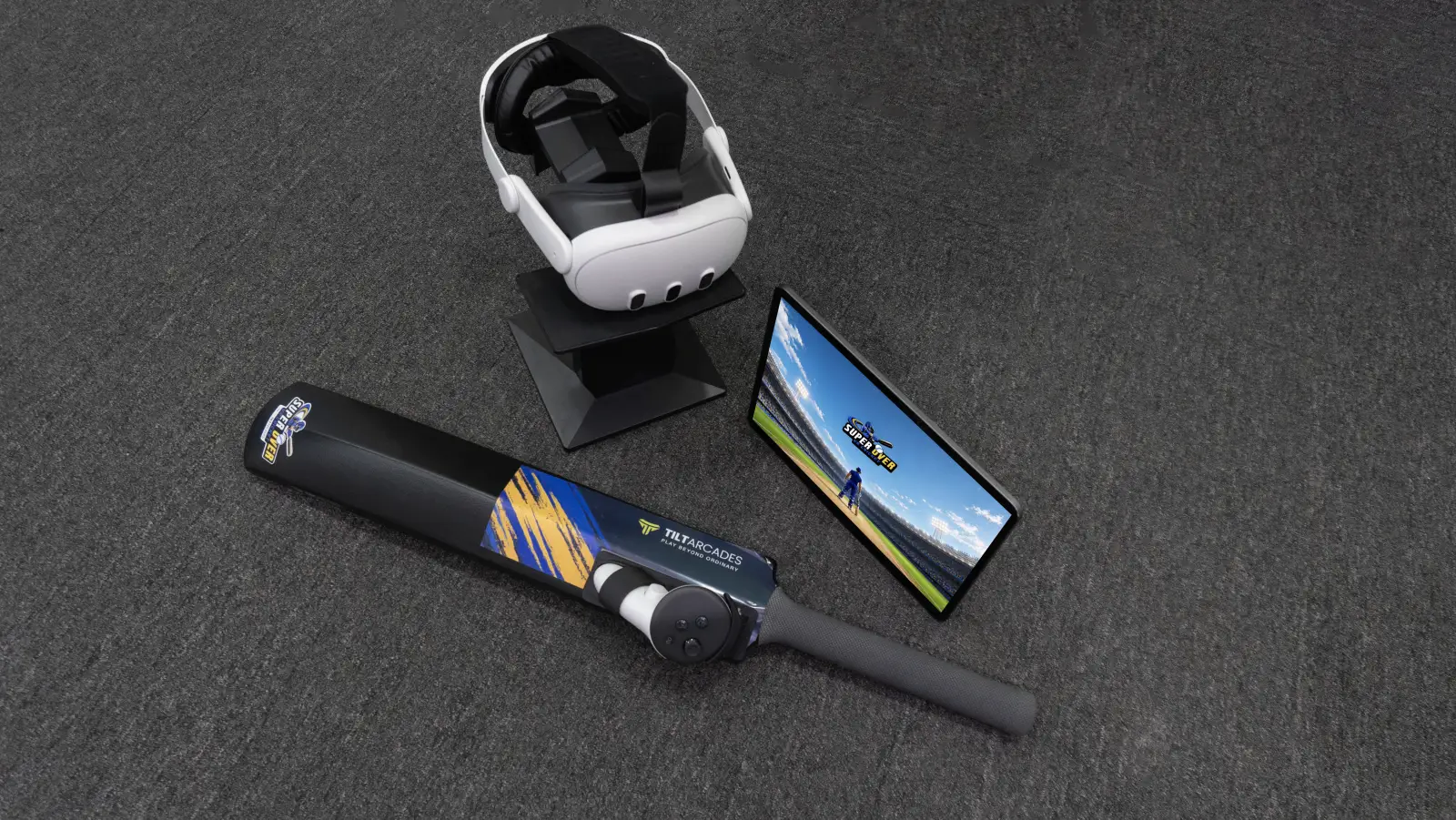 SuperOver kit laid out: Meta Quest 3 on its stand, SuperOver bat with controller mount and operator tablet